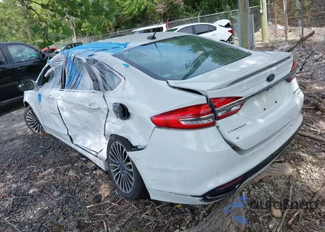 2017 Ford Fusion Titanium z USA, uszkodzony, nr VIN 3FA6P0K91HR115631